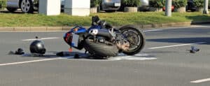 Motorcycle crashed in the road after a hit and run accident